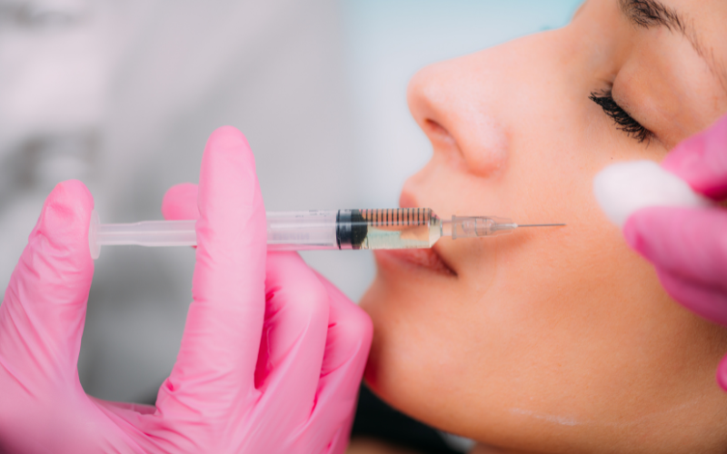 Woman receiving facial injection