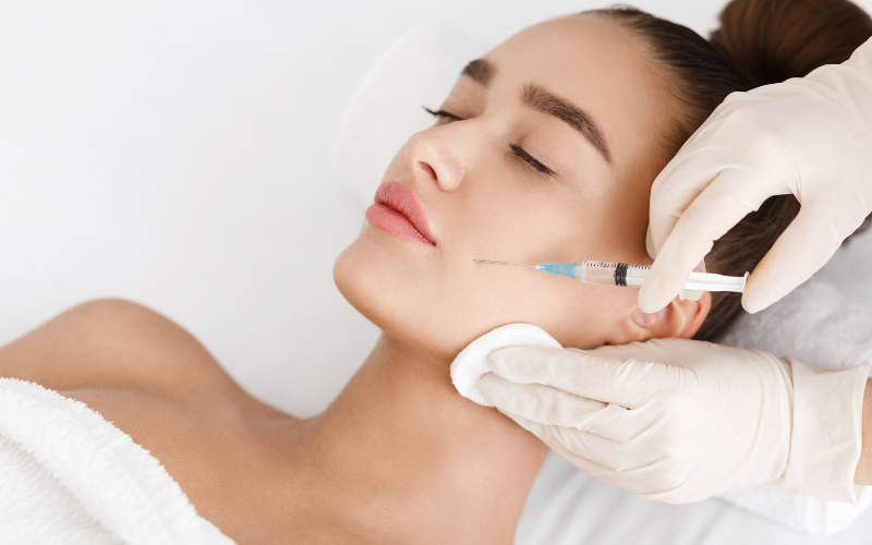 Woman receiving facial injection
