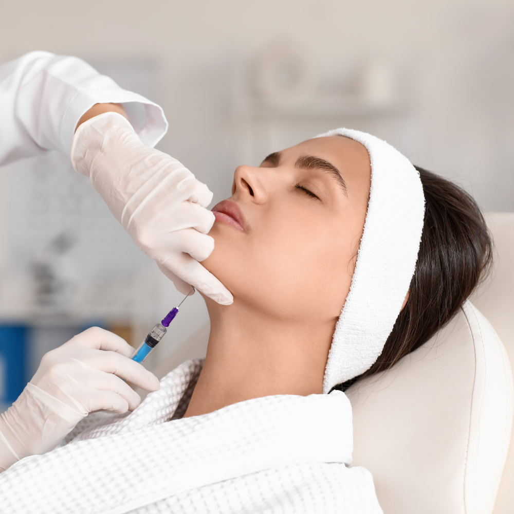 Woman receiving an injection under the chin
